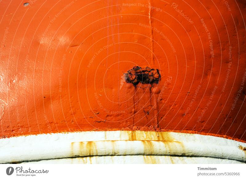 Sad boat hull ship fuselage Navigation Maritime Old damage Rust Rust marks Metal Orange White Light and shadow Denmark Deserted Close-up