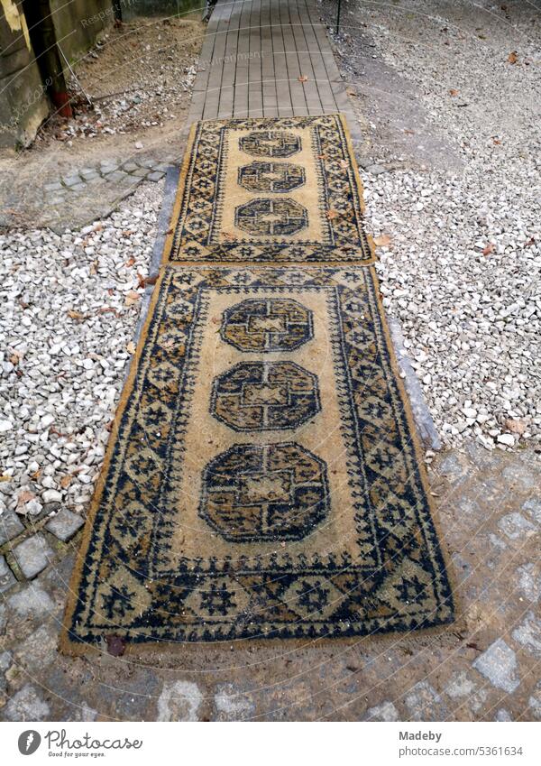 Old carpets as access to a doctor's office via a construction site in a listed building in Oerlinghausen near Bielefeld in the Teutoburg Forest in East Westphalia-Lippe