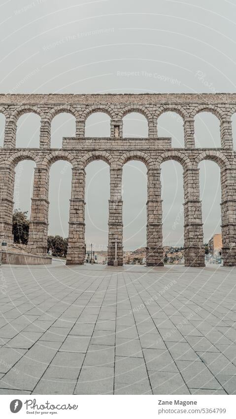 Ancient Roman aqueduct in Segovia, Spain, Europe travel background aqueduct segovia Aqueduct of Segovia Acueducto de Segovia spain spain travel europe travel