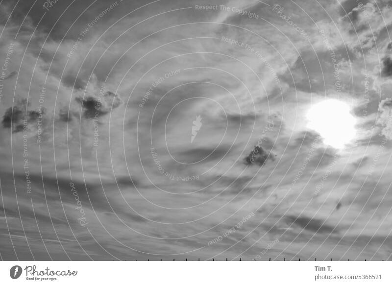 the sun behind veil clouds Mecklenburg-Western Pomerania b/w Sun Sky Clouds Black & white photo Exterior shot Deserted Day B/W B&W Calm