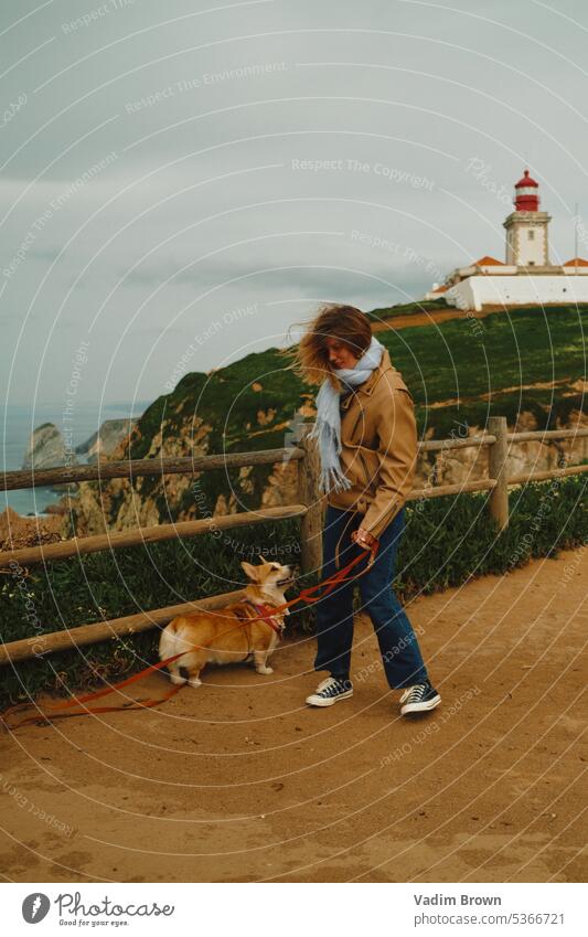 Girl near lighthouse with dog Freedom Relaxation Summer Water Summer vacation Landscape Tourism Colour photo Vacation & Travel wide Ocean Vacation romance