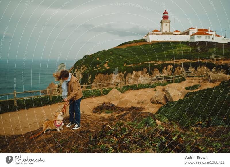 Girl near lighthouse with dog Freedom Relaxation Summer Water Summer vacation Landscape Tourism Colour photo Vacation & Travel wide Ocean Vacation romance