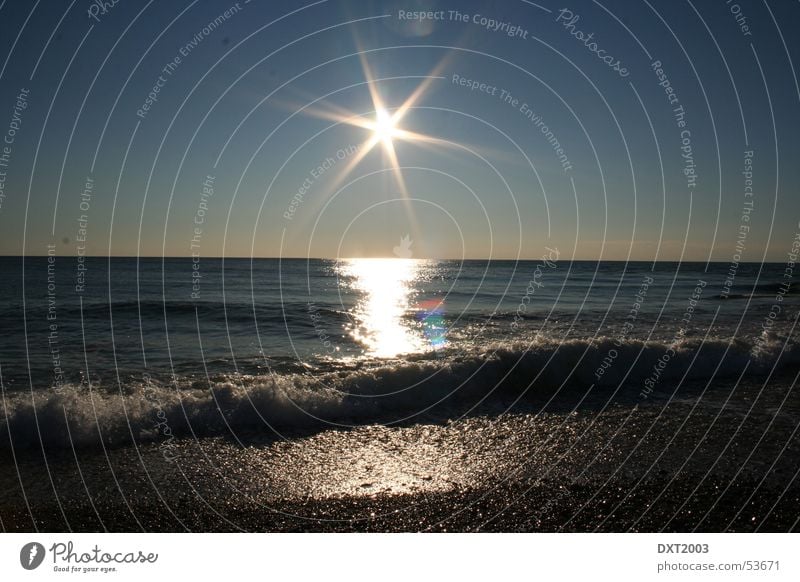 Sunset Beach Flashy Ocean Surf Gravel Waves To break (something) Exterior shot Water Reflection vacation in turkey beautiful sunset