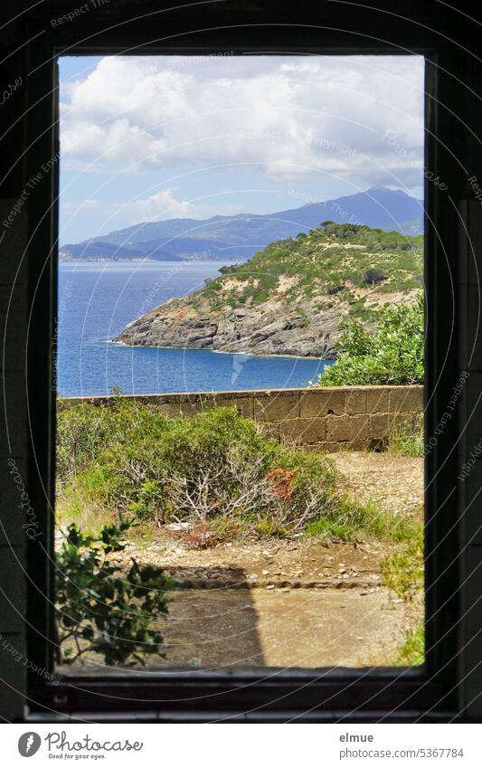 Elba - view through an old window to the coast in the southeast Mediterranean sea Ginevro Italy Ocean Thyrrenian sea Tuscan Archipelago Island Forest Blog