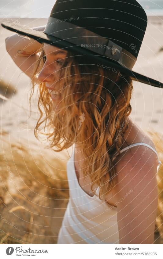 portrait of a woman in the hat beach girl sea summer vacation water beauty sun travel people ocean body sand leisure holiday fashion tropical lifestyle