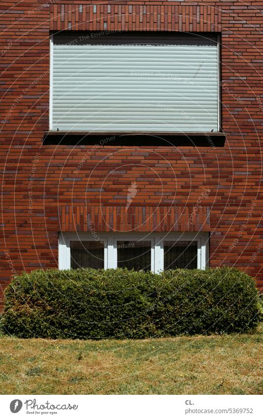 UT Bock auf Bochum | rollo, closed Window Roller blind Closed Hedge square Private sphere House (Residential Structure) Lawn Wall (building) Gloomy Dismissive