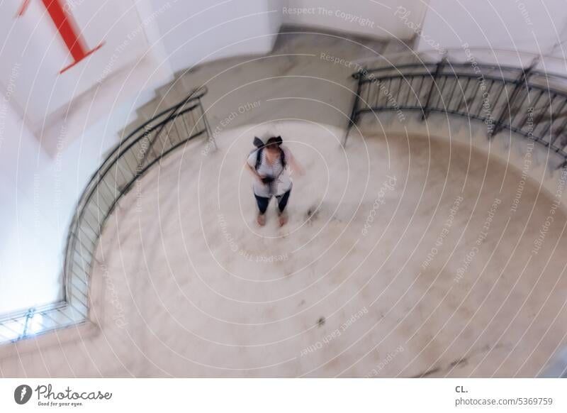 UT Bock on Bochum | vertigo Vertigo Stairs rail Tall Spiral Perspective Giddy Round Winding staircase person blurred Blurred Downward height Fear of heights