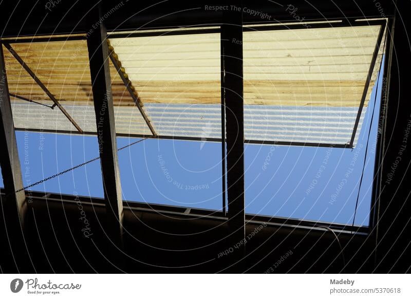 Large skylight with sunshade in yellow against blue sky and sunshine in bazaar in Adapazari in Sakarya province in Turkey Skylight Bazaar Covered market