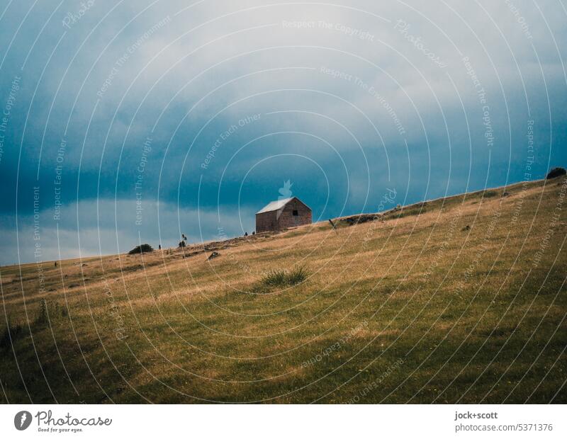 House between slope and clouds House (Residential Structure) Slope Clouds Landscape Sky Nature Hill Tasmania Australia idyllically Loneliness Above Lonely