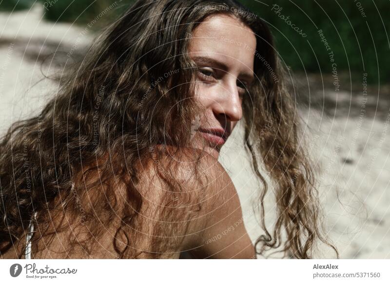 side portrait of young beautiful brunette woman with dimples in bikini on beach warm Summery Beautiful weather proximity Day Self-confident Youthfulness Skin