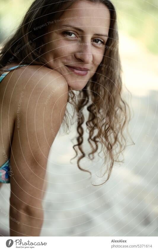 side portrait of young beautiful brunette smiling woman with dimples in bikini on beach warm Summery Beautiful weather proximity Day Self-confident Youthfulness