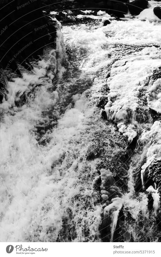 flowing water at the foot of a waterfall in Iceland iceland trip Icelandic Water cascade Flow fluid waterfall neckline Waterfall freezing cold icy cold Stream