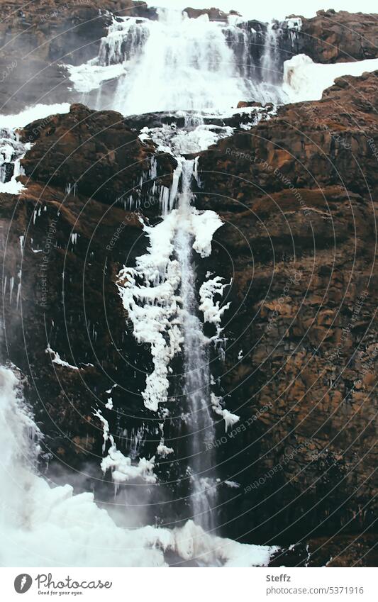 Waterfall with abstract ice shapes on Iceland Icelandic Ice molds quick-frozen Frost icily Cold freezing cold Bizarre Freeze Freezing chill iced White Abstract