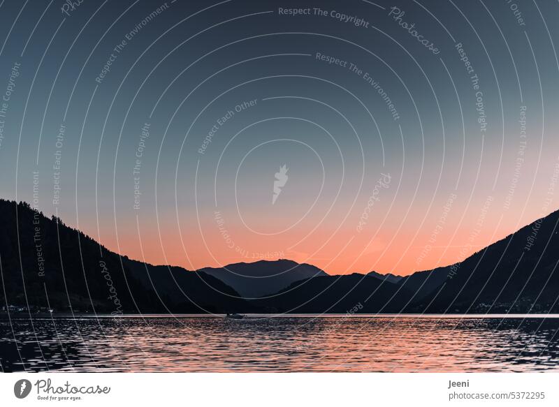 When the day ends in the mountains Nature Sunlight Relaxation vacation Austria Moody Orange Atmosphere tranquillity Mountain relaxation Alps Mountain lake Lake