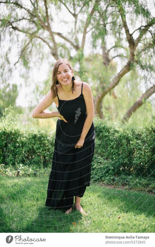 Woman smiling and laughing in nature laughing woman Smiling smiling woman happy portrait outdoors lifestyle cheerful happiness young beautiful natural Nature