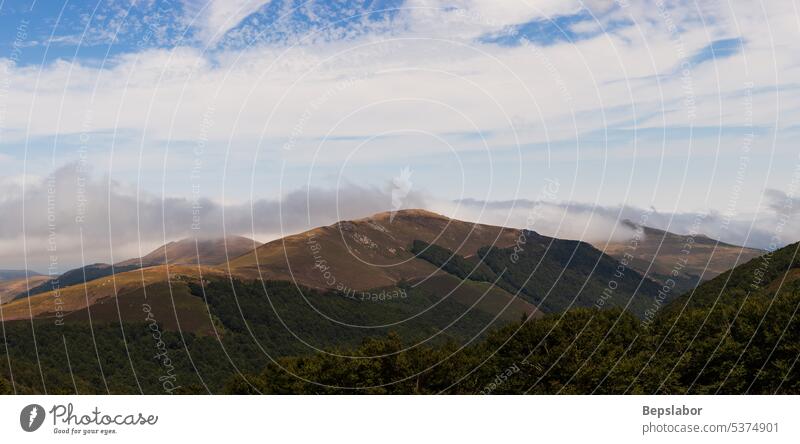 Mountain landscape, along the Way of Saint James. French Pyrenees hill scenery scenic france green nature sky french rural cloud valley peak hiking pilgrimage