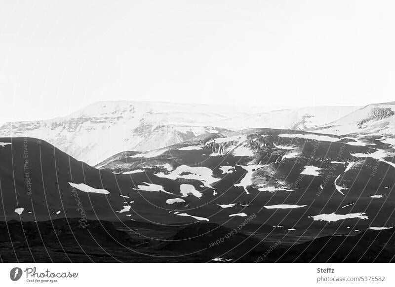 Hills and mountains in the Krafla area of Iceland Rock Snow Icelandic residual snow North Iceland rock formation iceland trip silent fabulous natural forms