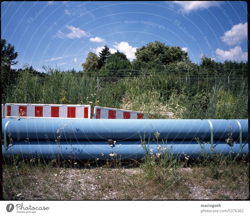 Construction site in the wilderness conduit Water pipe Infrastructure Pipe Conduit Transmission lines Effluent Provision Industry Exterior shot Deserted