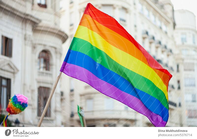 The rainbow flag or pride flag is a symbol of LGBT pride and LGBT social movements in Valencia, Spain rights colorful graphic vector template background