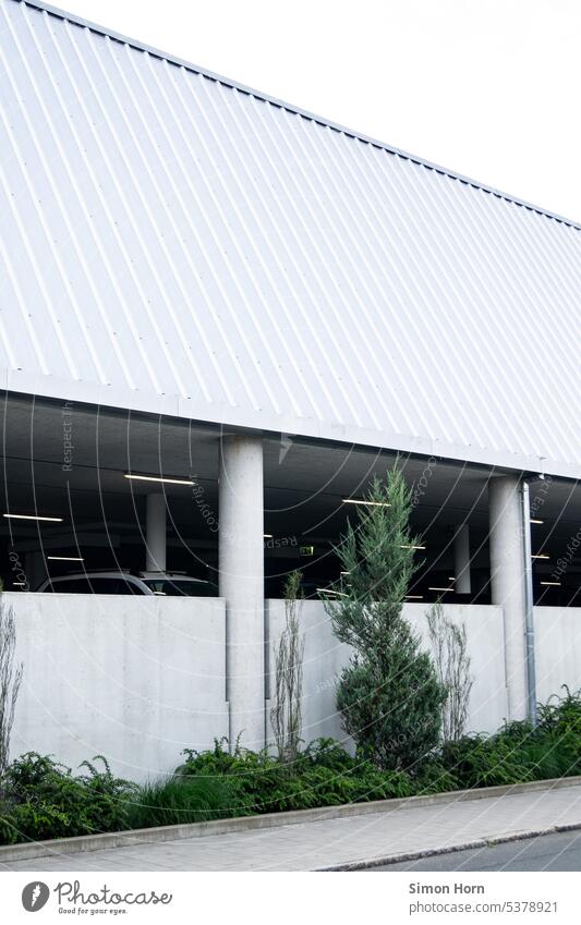 Exterior view of parking garage with fluorescent tubes Parking garage surface Fluorescent Lights Hidden Shadow Artificial Mobility standstill Parking area