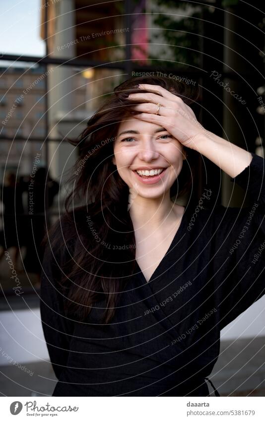 Santa Laughing time next to opera house 1 woman Happy long hair charming as helll Nail polish eye contact Sunlight real people Warmth feminine joyful Cute