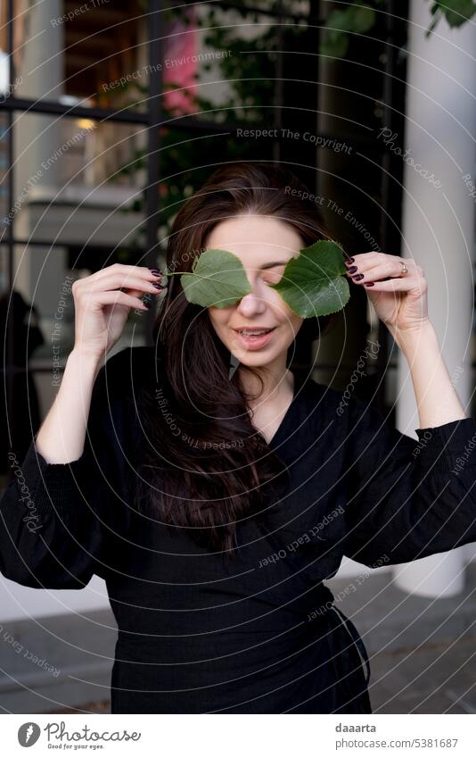 Santa playing with leaves Next to Opera House 1 Woman Happy long hairs damn charming Nail polish Eye contact Sunlight real people Warmth Feminine joyfully