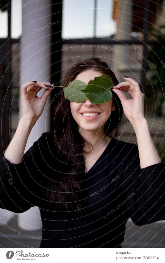 Santa playing with leaves Next to Opera House 2 Woman Happy long hairs damn charming Nail polish Eye contact Sunlight real people Warmth Feminine joyfully