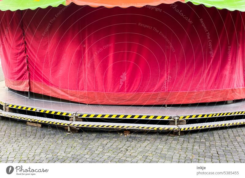 End of the season Carousel Red Circus Closed Drape wintering grounds Fairs & Carnivals hustle and bustle machine tarpaulin Deserted Exterior shot Copy Space