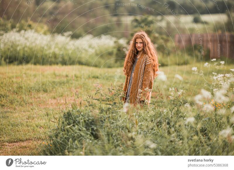 Redhead girl on the flowers field Smiling pretty long hairs naturally Model Girl portrait redhead youthful Natural color Flower Beauty & Beauty Healthy Face