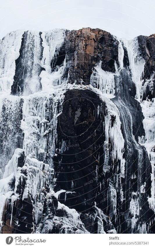 Gufufoss waterfall in Seydisfjördur on Iceland East Iceland Waterfall Seyðisfjörður Freeze Frost iced Ice molds Frozen Snow and ice Cold White