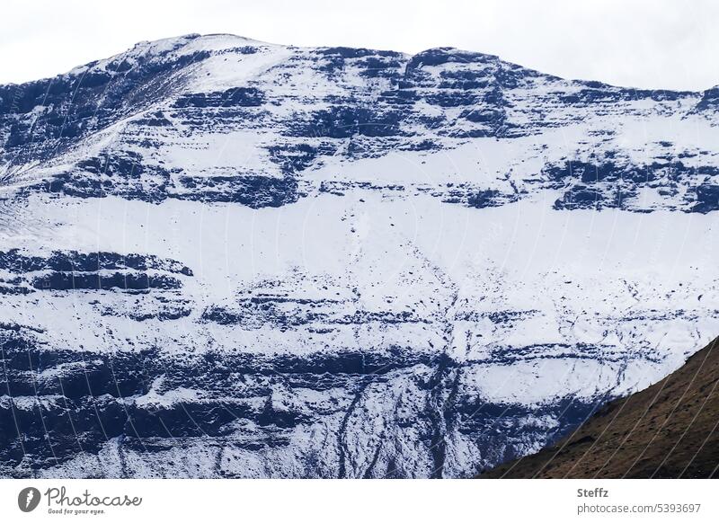 Faroe Island covered with snow färöer Faroe Islands Steep face Rock rock island Faroe island Sheep Islands rocky shore Rock mound Uninhabited Slope