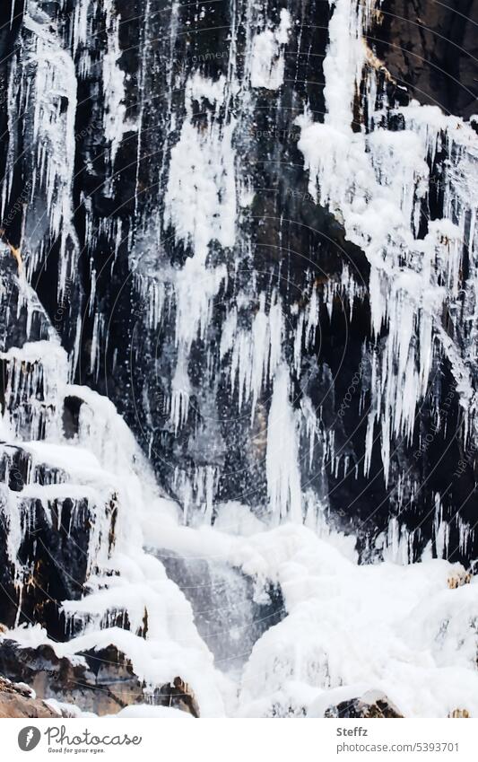 Waterfall neckline with bizarre ice shapes on Iceland quick-frozen icily Cold Bizarre freezing cold Icicle Ice molds bizarre ice forms Frost ice figures