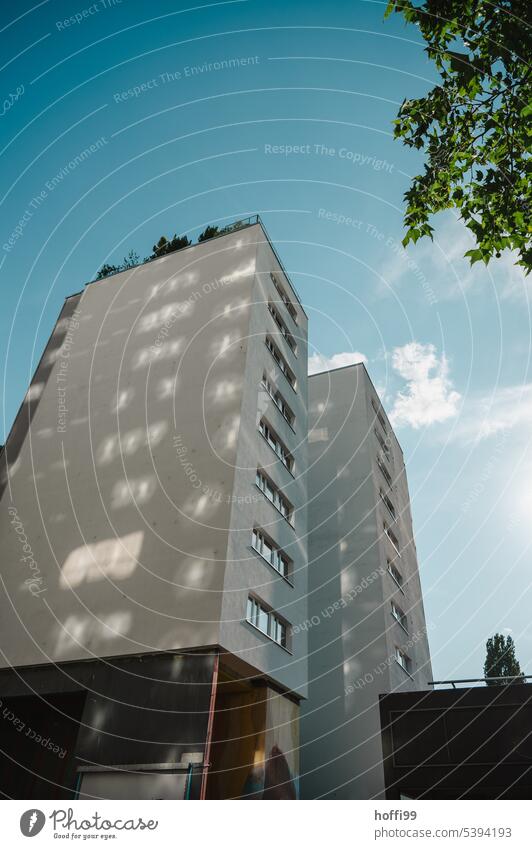 High-rise building in the shade with light reflections on a beautiful summer's day Reflection Light (Natural Phenomenon) Sunlight Shadow Sunbeam Facade Contrast