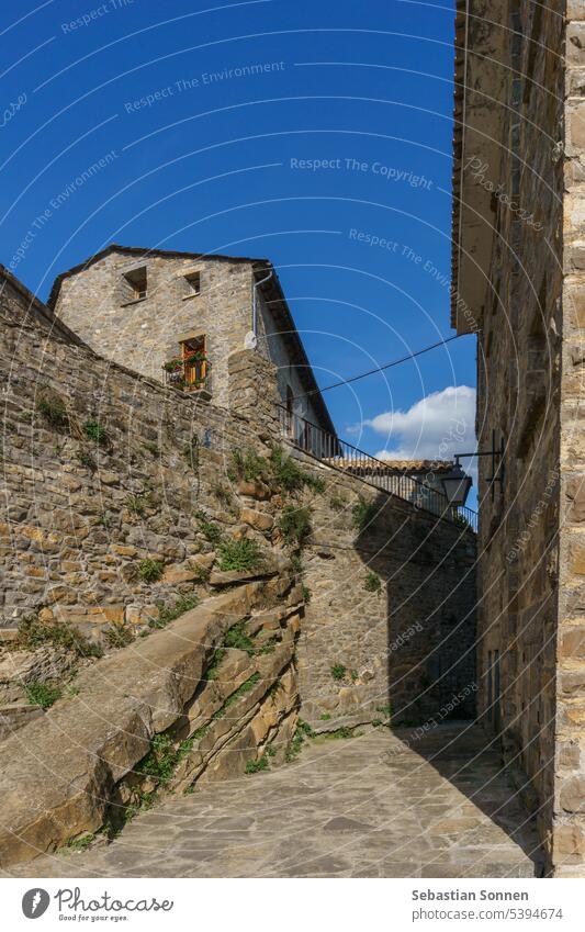 Street with stone houses in the medieval village of Ainsa in the Pyrenees, Aragon, Spain. ainsa Ancient Village huesca Stone Architecture Old Building travel