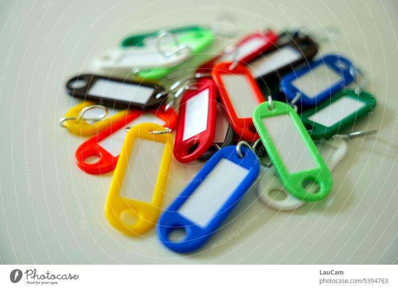 Colorful key rings Keyring variegated arrange Inscribe allocate Arrangement Highlight Heap door Safety Detail Key service Keyhole helpful Help bunch of keys