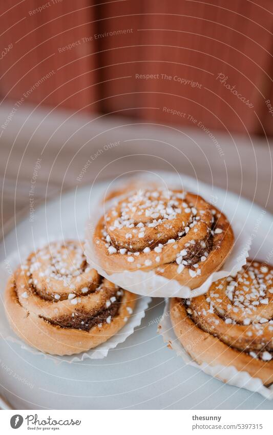 Fika in Sweden cinnamon buns Cinnamon buns to bake bake on baked cinnamon buns biscuits fika Swedish house Swedish red sweden vacation Sugar canelbullar