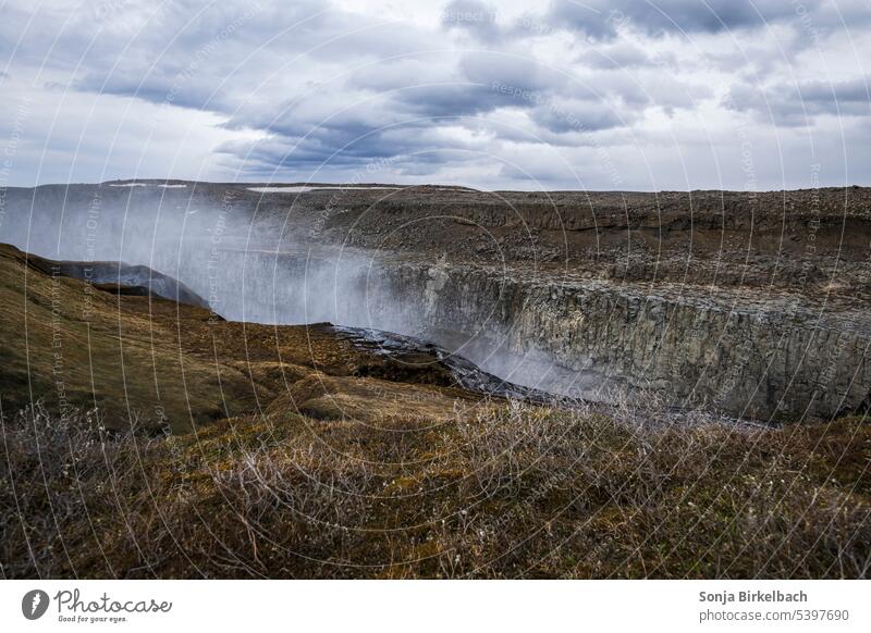 Bubbling spray at Dettifoss in Iceland dettifoss Landscape Waterfall Colour photo Environment Canyon Nature Rock Exterior shot Elements River Day Force Deserted