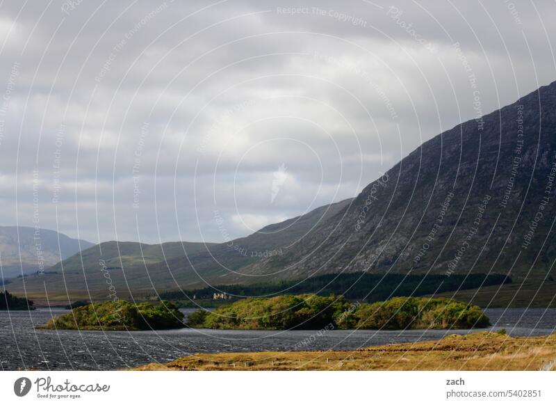 Connemara / Ireland Green Nature Landscape Clouds Meadow Grass Hill Water Lake Mountain hilly Sky cloudy