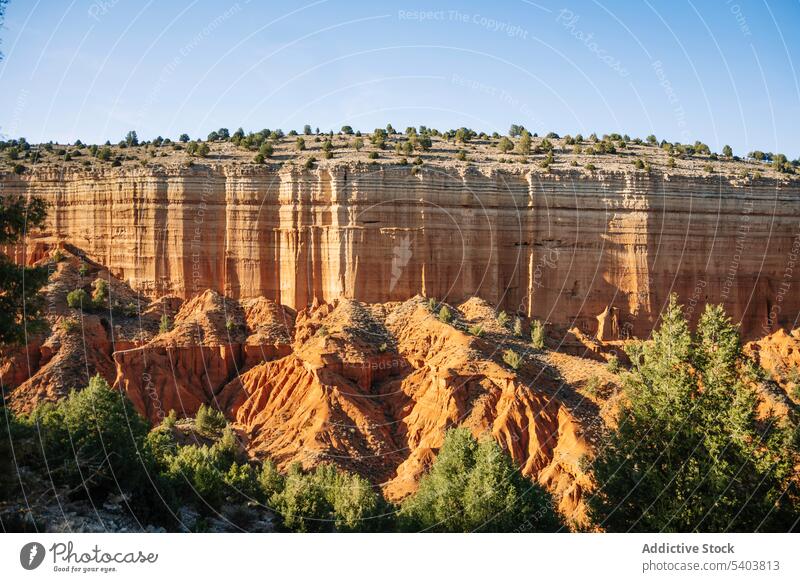 Rocky formations in desert valley mountain ridge canyon arid highland landscape terrain nature blue sky rojo teruel spain rough scenery scenic range environment