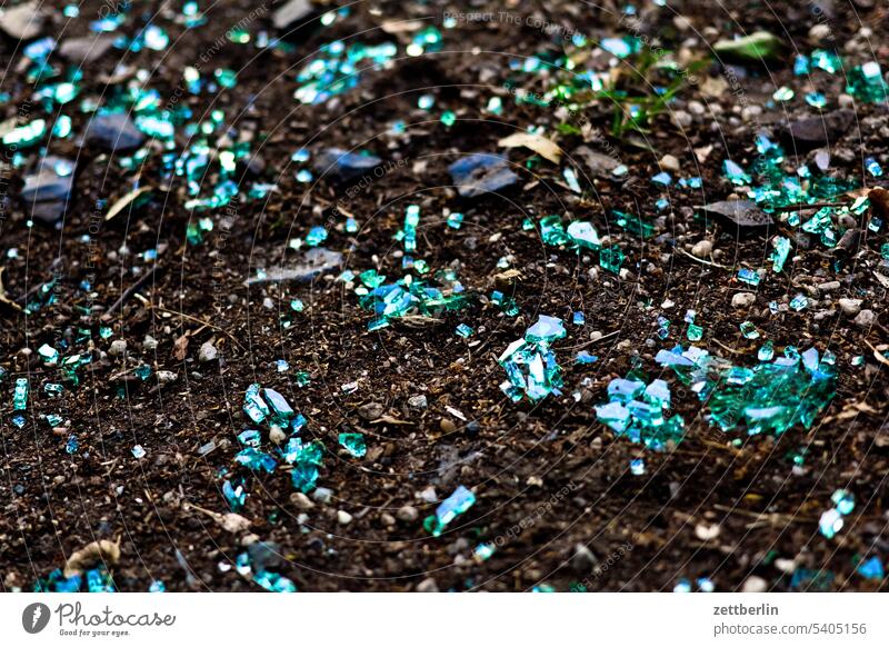 Broken glass on the sidewalk waste Ground Earth floor peril Dangerous Glass Crystal Trash scgarf Slice shards dirt Risk of injury tart structure texture Sand