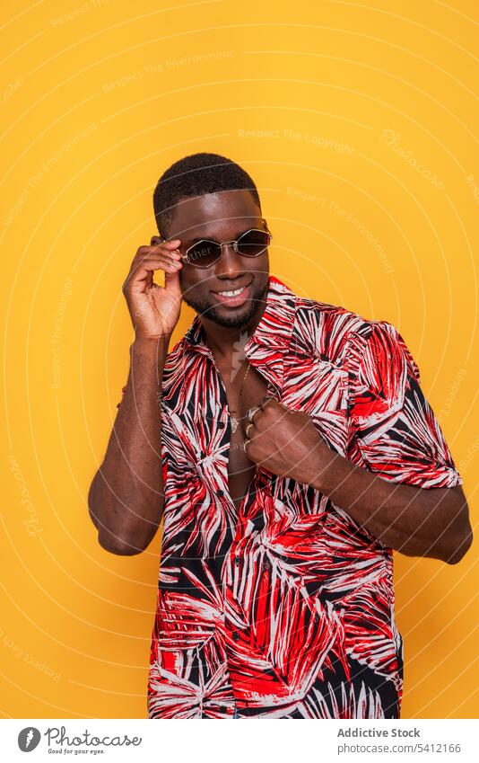 Happy black man in sunglasses smile positive style confident happy joy glad casual male african american ethnic optimist content pleasure satisfied charismatic