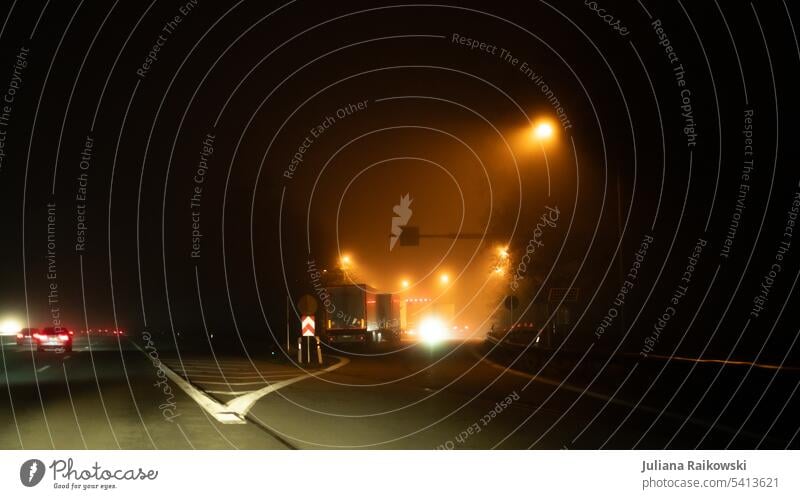 Road at night and fog Car journey Motoring Calm Trip Deserted Exterior shot Colour photo Copy Space top Transport Street Traffic infrastructure Road traffic