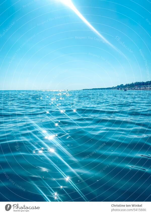 Summer at the North Sea Beautiful weather calm weather Background picture pretty silent Horizon calm sea light reflexes shine Day Light reflections in the water