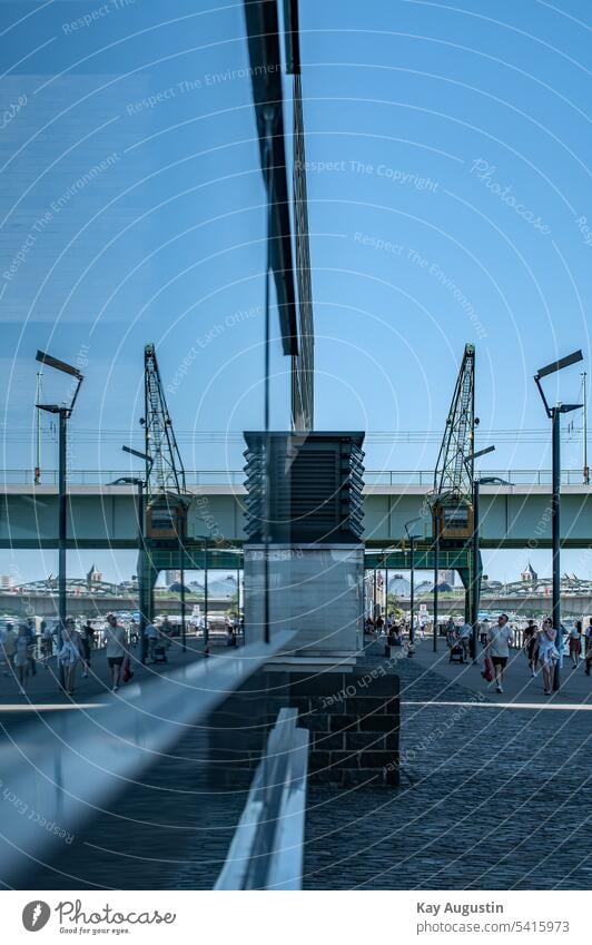 Promenade reflection Cologne Severins bridge Severinsbrücke at the Rheinauhafen cologne Building Exterior shot Bridge rheinufer Window Window pane