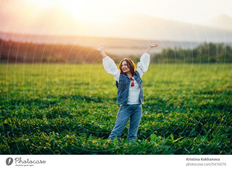 Woman with open up arms to sun. Hands up. Free girl, amazing summer adventure happy ukrainian woman young beautiful beauty female person stylish portrait