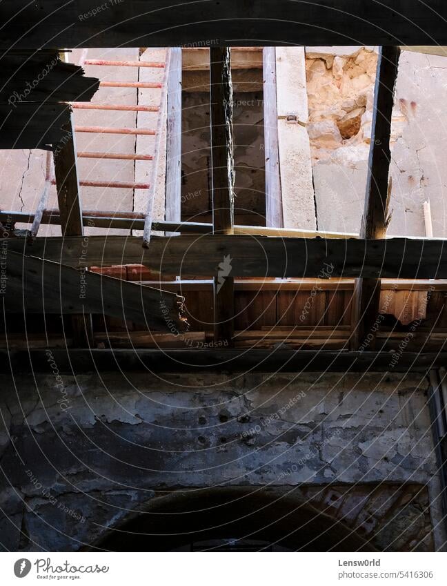 Damaged roof inside an abandoned house black broken building damage destroyed destruction empty home interior old room ruin vintage wall wood