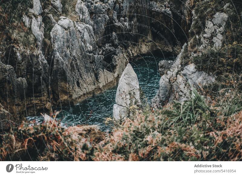 Picturesque rocks and sea cliff arch cave landscape natural passage water hole picturesque peaceful breathtaking tranquil calm idyllic scenic high beautiful