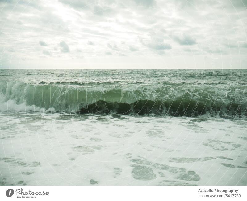 Big waves in the sea after the rain. abstract background beach beautiful blue calmness coast coastal coastline concept dangerous dramatic environmental flowing