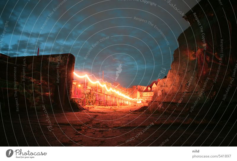 breakthrough Sky Clouds Night sky Industrial plant Ruin Architecture Wall (barrier) Wall (building) Blue Red Concrete Fairy lights Twilight Graffiti Uninhabited