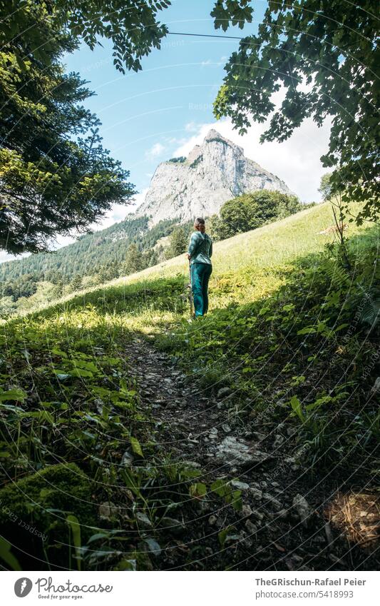 Woman with view of big myth (mountain) Hiking Vantage point Mountain Switzerland Nature Landscape Alps Exterior shot Colour photo Tourism Clouds